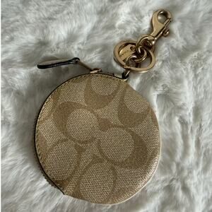 COACH CIRCULAR COIN POUCH BAG CHARM IN SIGNATURE CANVAS